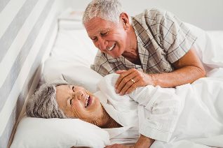 Senior couple in bed